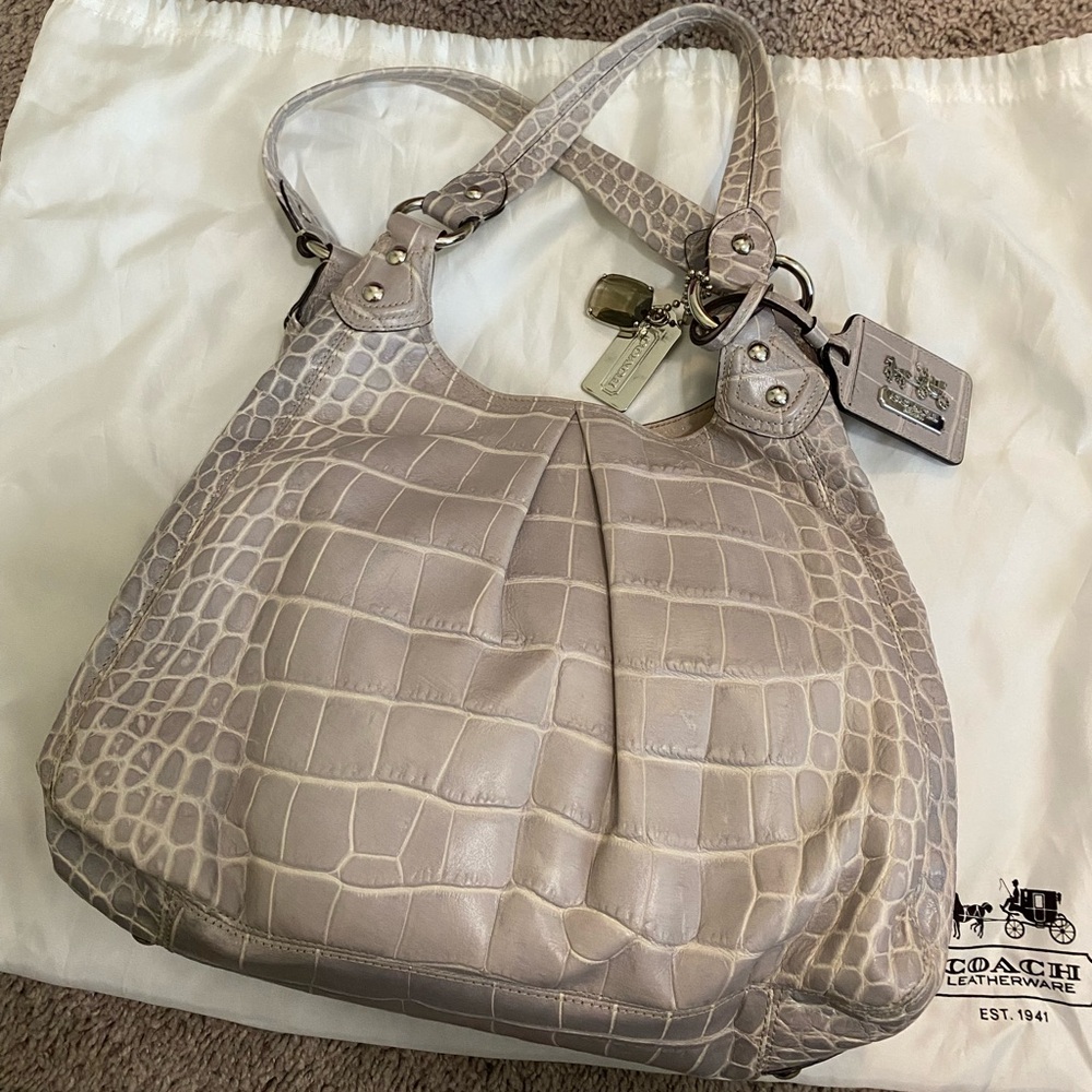 Authentic Coach Crocodile Leather Handbag
Light grey with a lilac hue